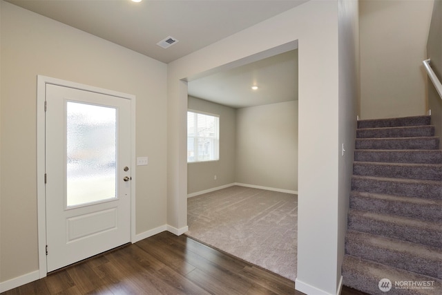 entrance foyer featuring dark hardwood / wood-style flooring