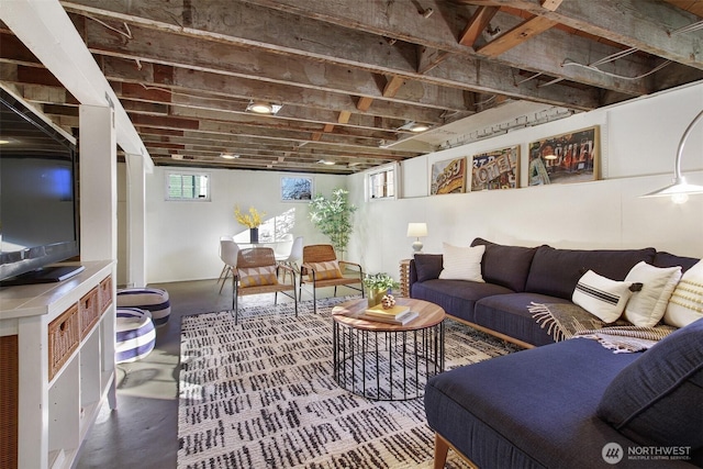 living room with concrete flooring