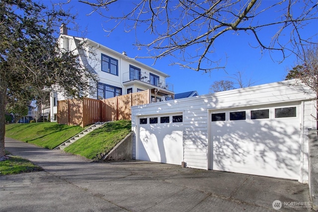 garage with a lawn