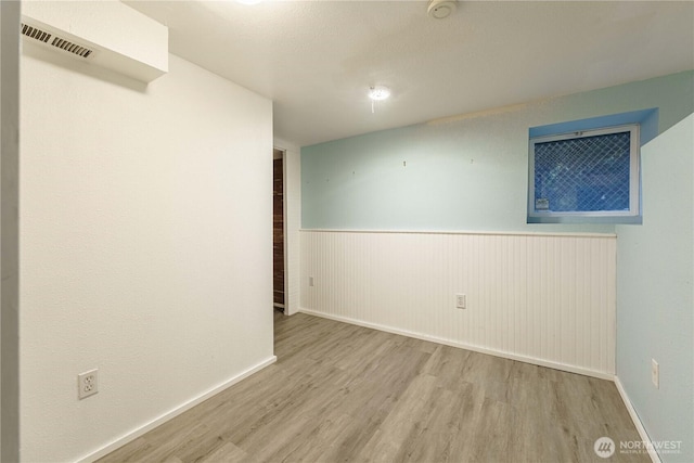 empty room featuring light hardwood / wood-style flooring