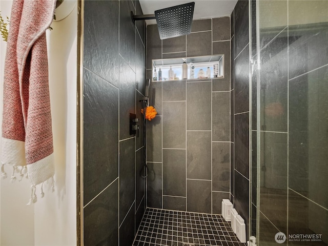 bathroom featuring an enclosed shower