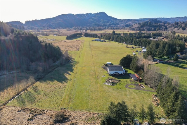bird's eye view with a mountain view and a rural view