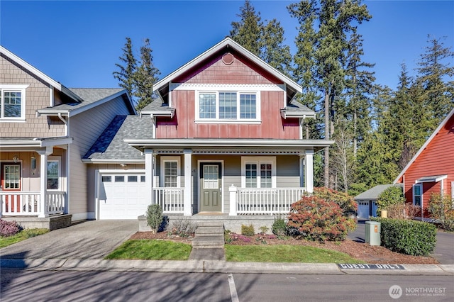 view of front of home with a garage and covered porch