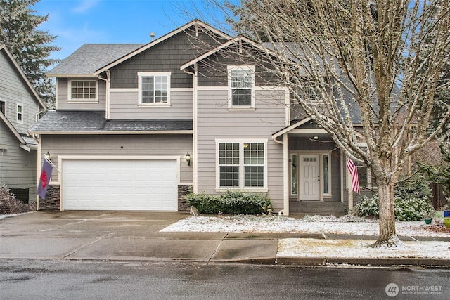 view of front of home with a garage