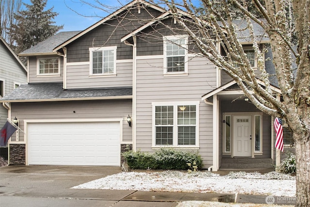 view of front of house with a garage