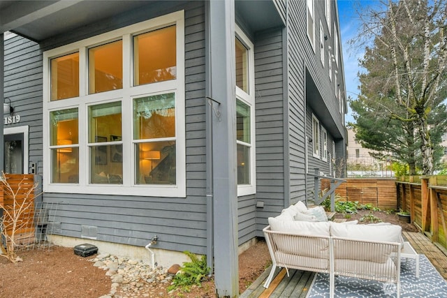 view of home's exterior featuring an outdoor living space