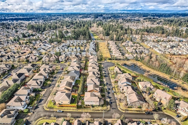 aerial view with a water view and a residential view