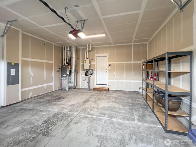 garage featuring a garage door opener and electric panel