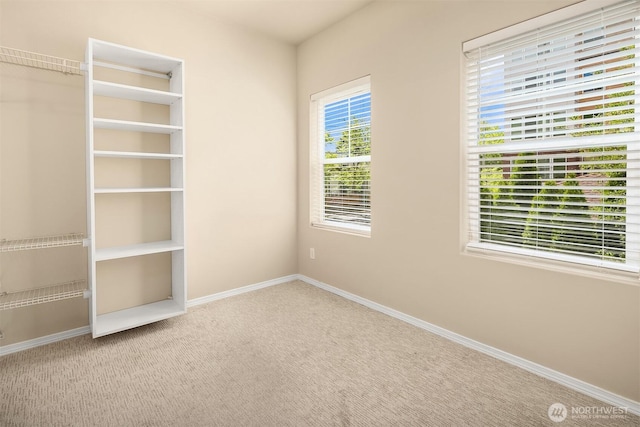 unfurnished bedroom with light carpet