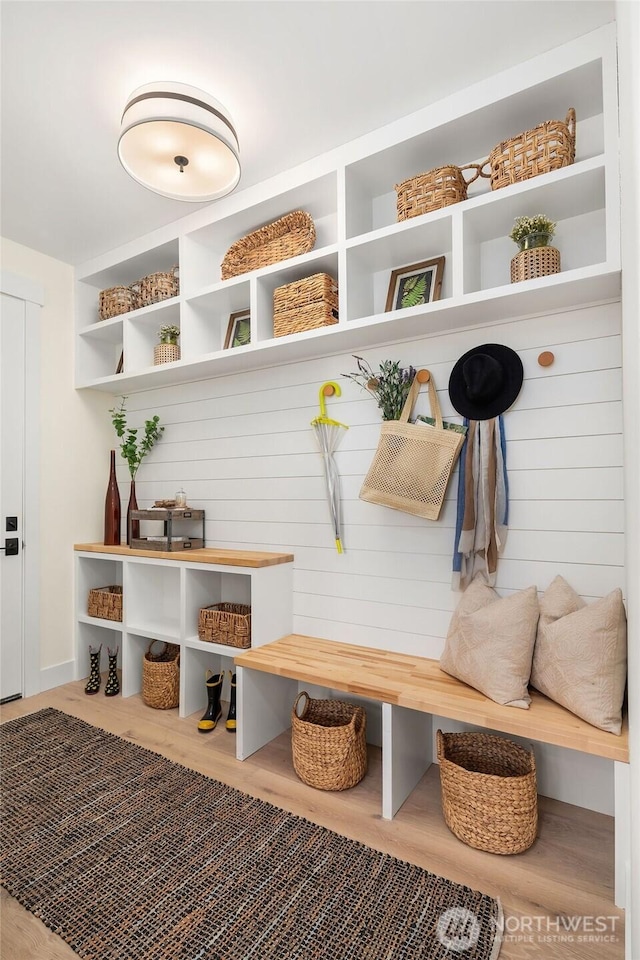 mudroom featuring wood-type flooring