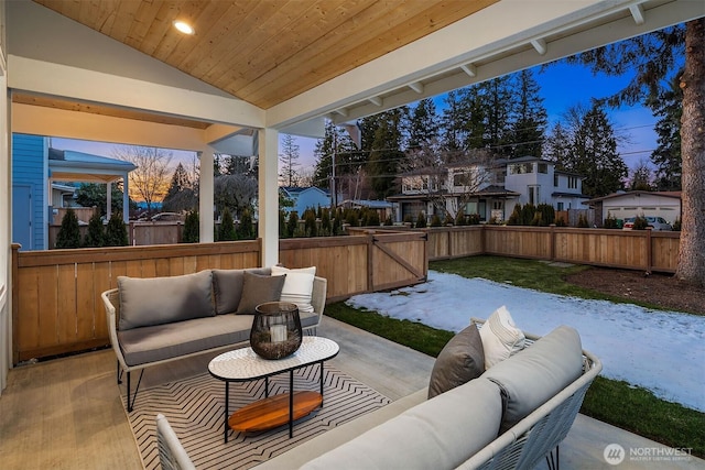 patio terrace at dusk with an outdoor living space