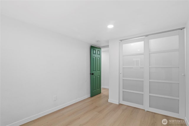 unfurnished bedroom with light hardwood / wood-style flooring