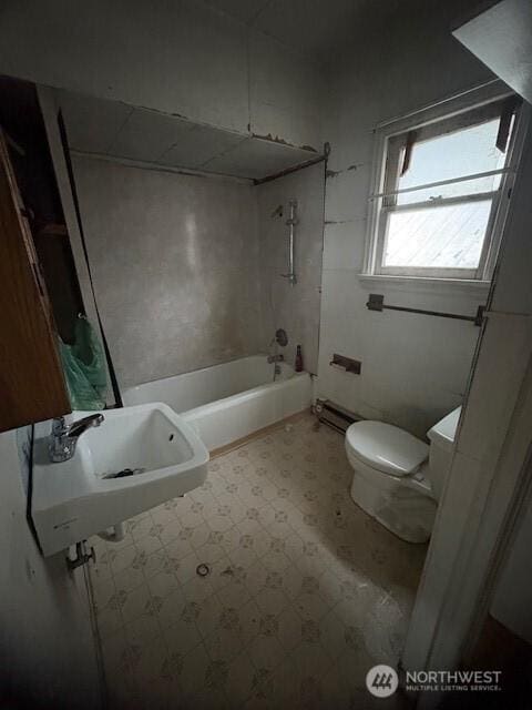 full bathroom featuring shower / tub combination, toilet, and sink