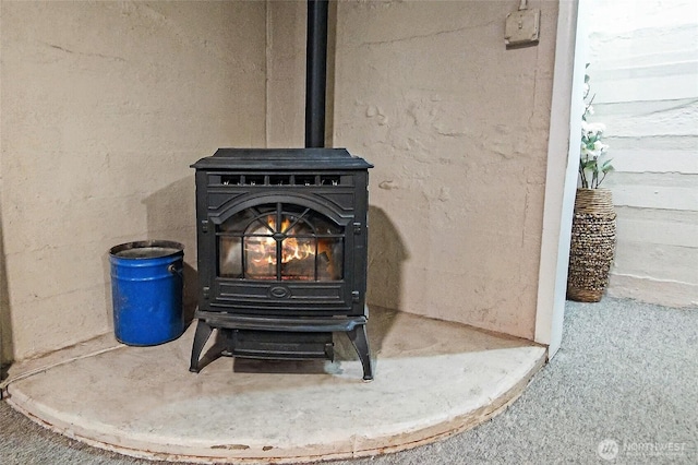 interior details featuring a wood stove