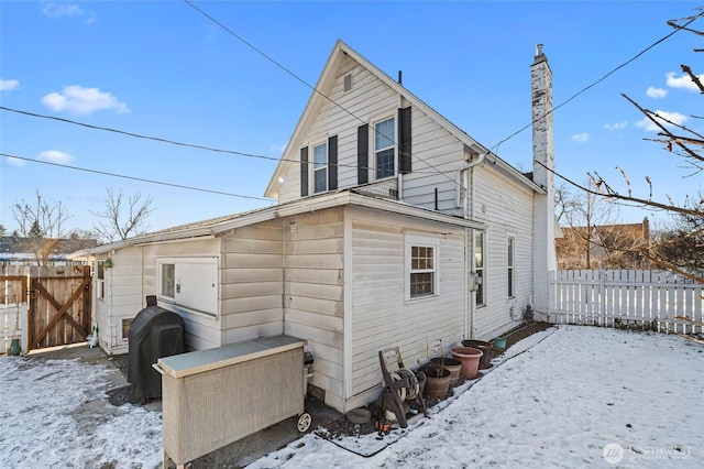 view of snow covered property