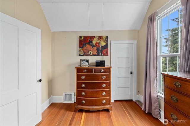 404 N Maple St, Colville, WA 99114 - bedroom with vaulted ceiling, baseboards, light wood-style flooring, and crown molding
