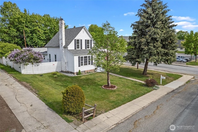 404 N Maple St, Colville, WA 99114 - view of front of home with a shingled roof and a chimney