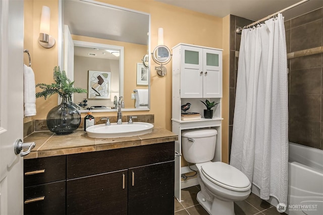 full bathroom featuring shower / bath combination with curtain, vanity, toilet, and tile patterned flooring