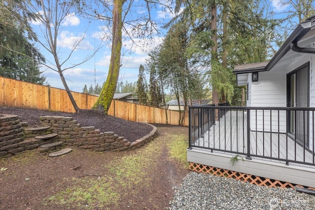 view of yard featuring a deck