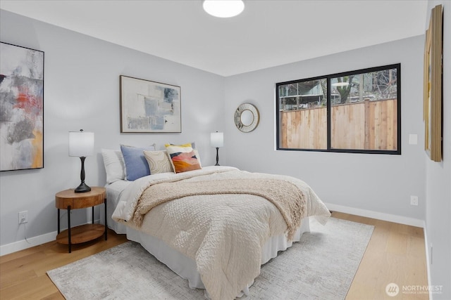 bedroom featuring light hardwood / wood-style floors