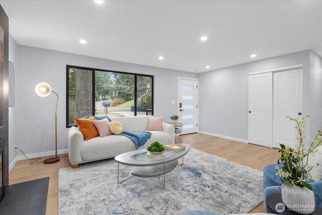 living room with light hardwood / wood-style floors