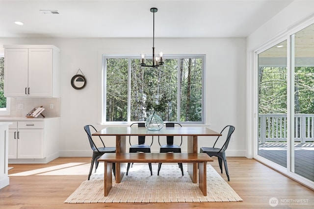 16806 62nd St SE, Snohomish, WA 98290 - dining area featuring recessed lighting, an inviting chandelier, light wood-style flooring, baseboards, and visible vents