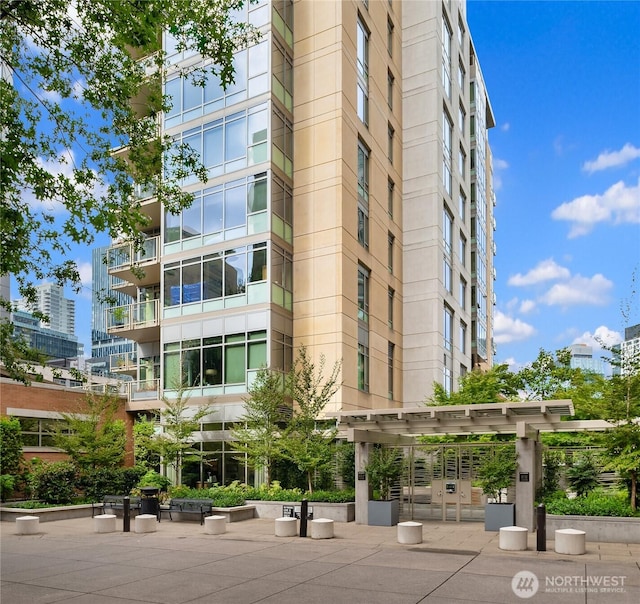 view of property with a view of city