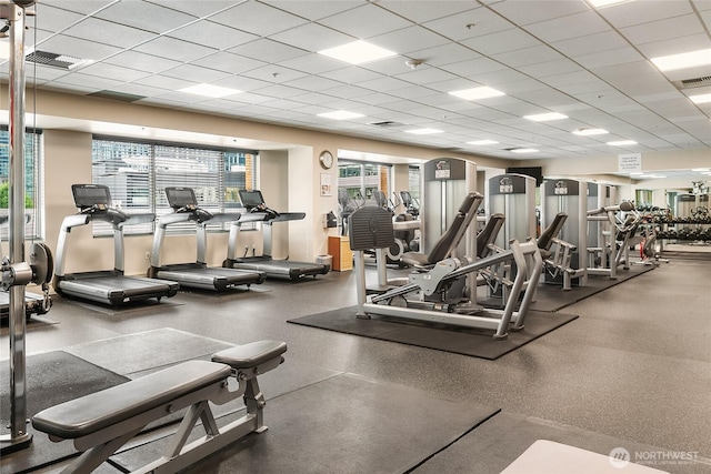 exercise room with a drop ceiling