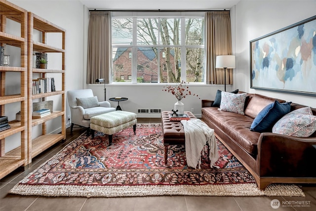 living area with plenty of natural light and visible vents