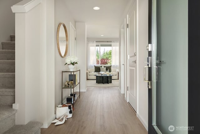 hallway featuring light wood-type flooring