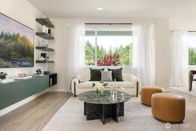 sitting room with light wood-type flooring
