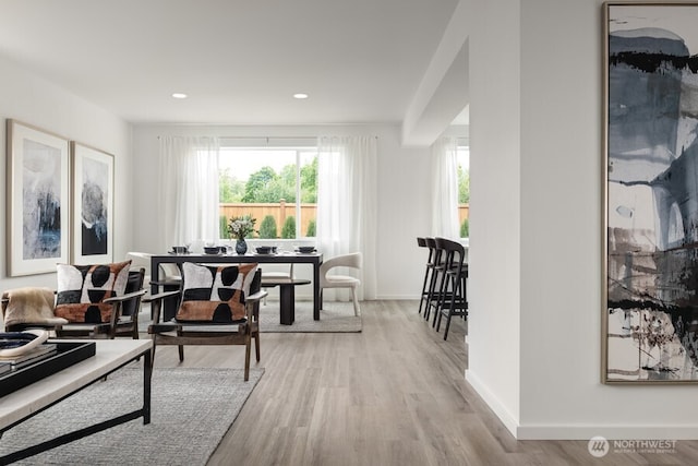 dining space featuring light hardwood / wood-style flooring