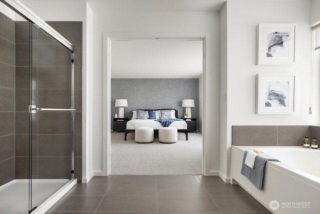 bathroom featuring tile patterned floors and separate shower and tub