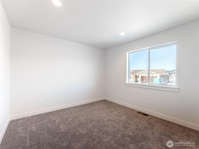 view of carpeted spare room