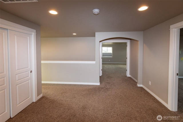 corridor featuring carpet flooring