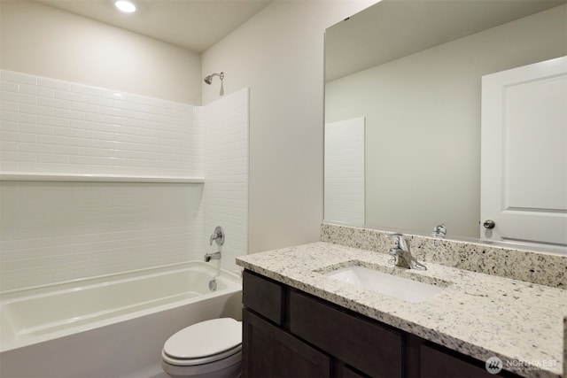 full bathroom with shower / bath combination, vanity, and toilet