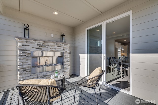 wooden deck with an outdoor hangout area