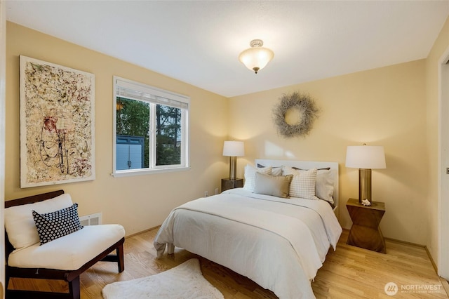 bedroom featuring light wood-type flooring