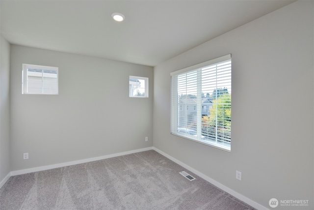 view of carpeted spare room