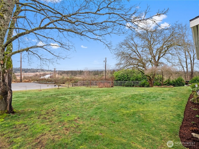 view of yard with fence