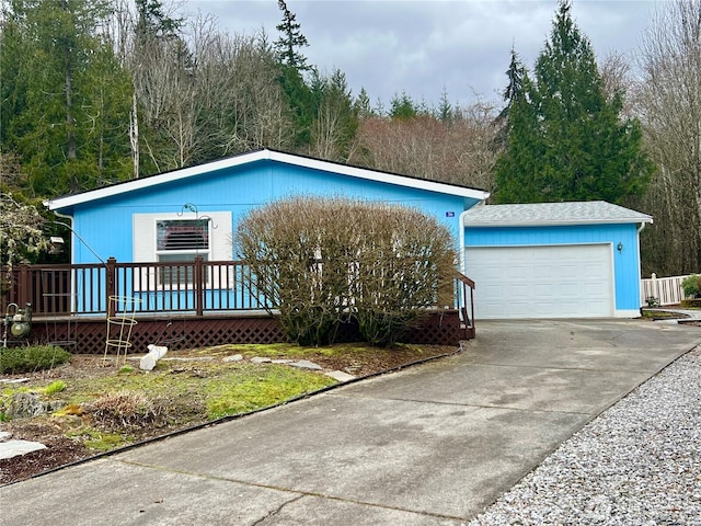 single story home with an attached garage and driveway