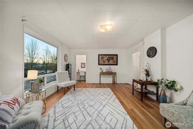 sitting room with wood finished floors