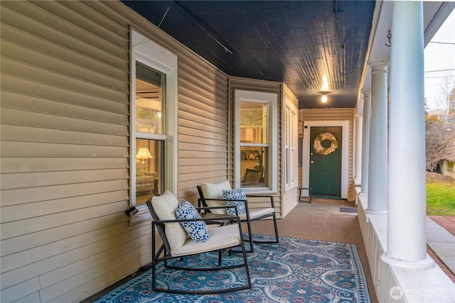 doorway to property featuring a porch