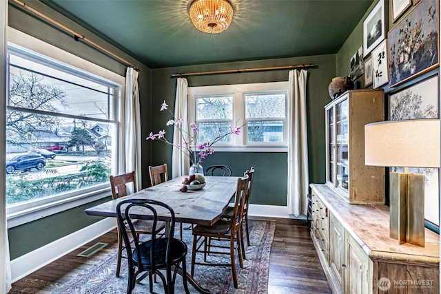 dining room featuring dark wood-type flooring