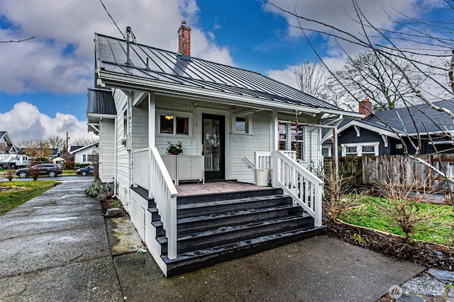 bungalow-style home featuring covered porch