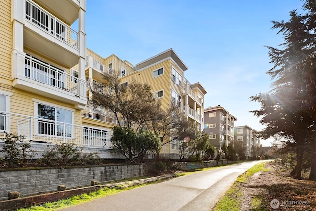 view of building exterior with a residential view