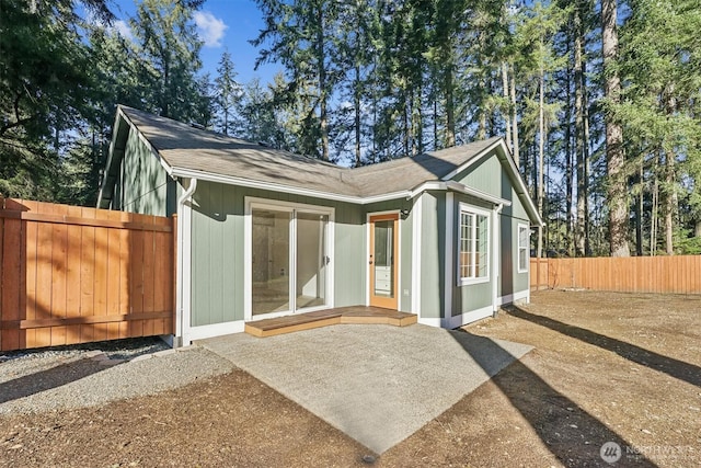 exterior space featuring a patio and fence