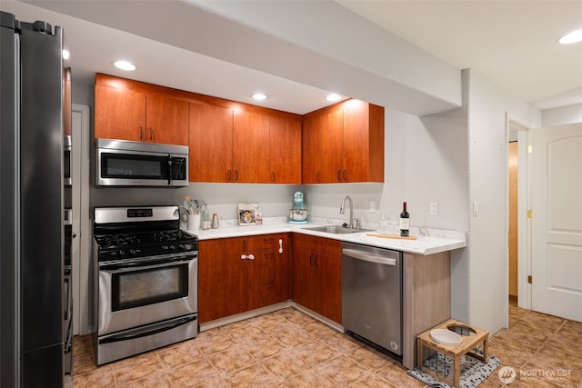 kitchen with sink and appliances with stainless steel finishes