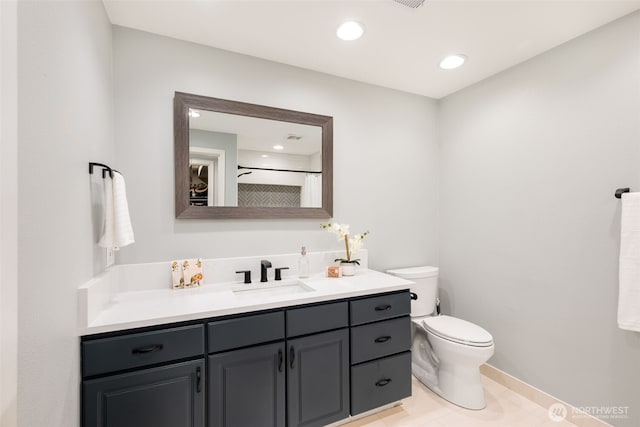 bathroom featuring a shower with curtain, vanity, toilet, and tile patterned flooring