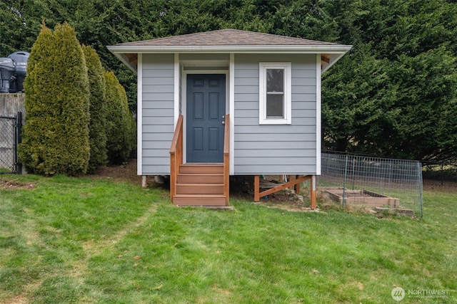 view of outdoor structure with a yard